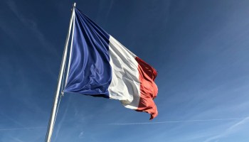 Yugoslavia flag under blue sky